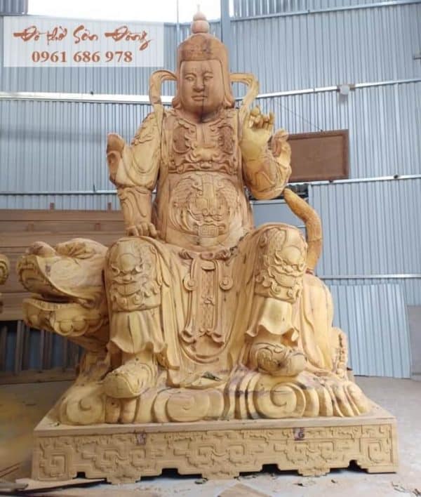 Tượng hộ pháp cưỡi kỳ lân bằng gỗ mít